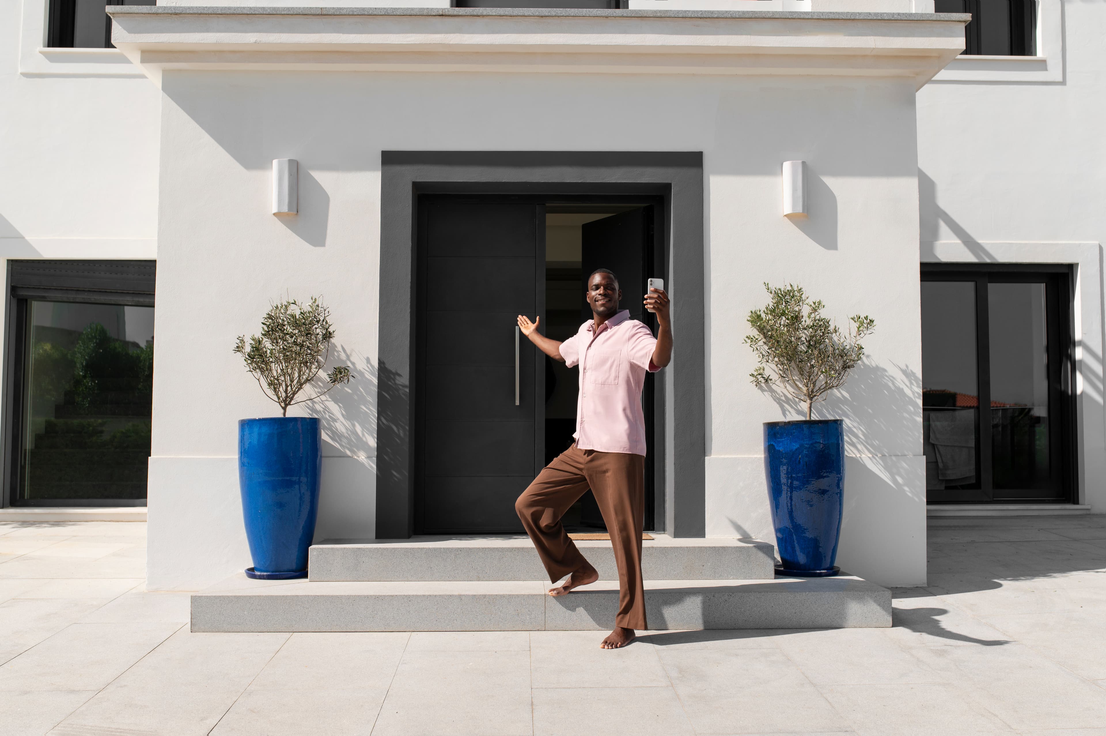 Resident stepping out of a modern home